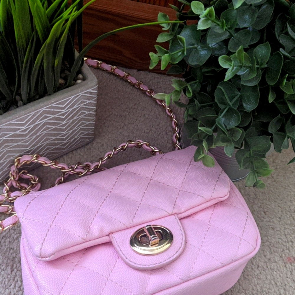 Pink crossbody bag.